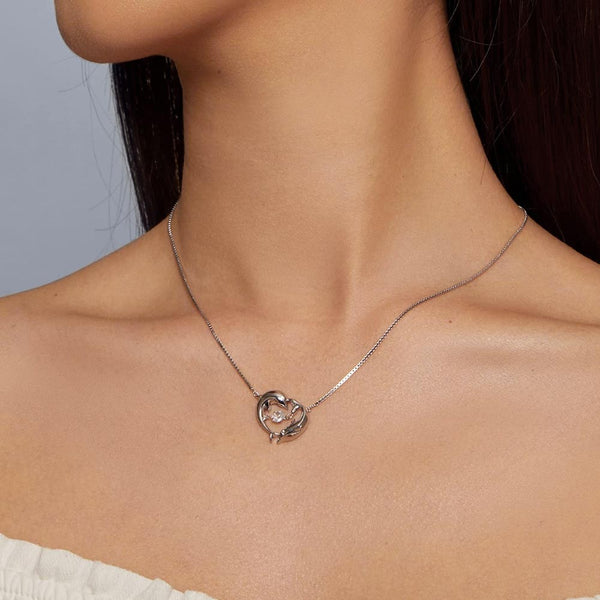 Model wearing a Double Dolphins Necklace